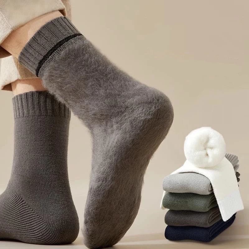 Warm gray socks and a stack of folded neutral-colored socks
