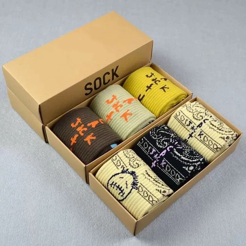 Patterned socks presented in a cardboard gift box